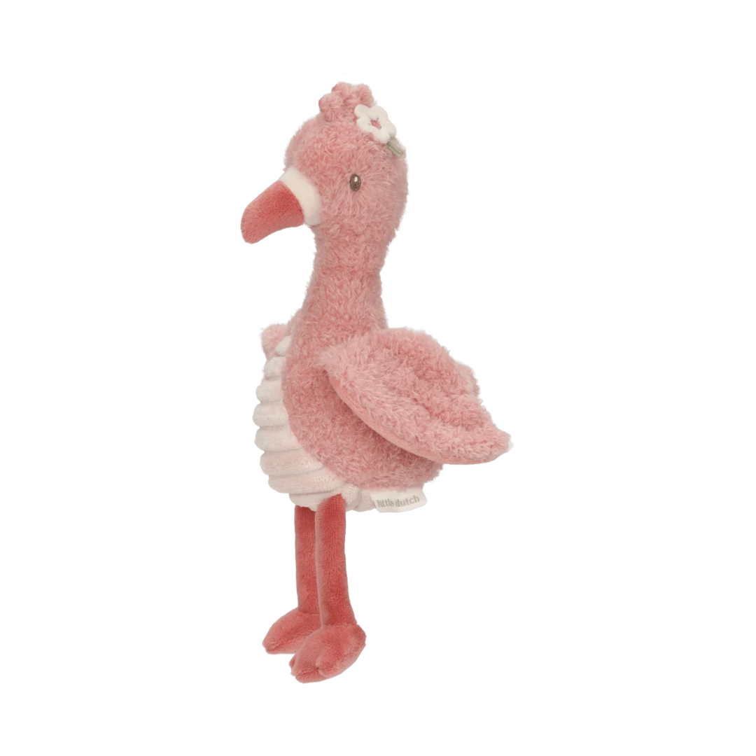 Pelúcia de flamingo cor-de-rosa com detalhes em branco e rosa, em fundo branco