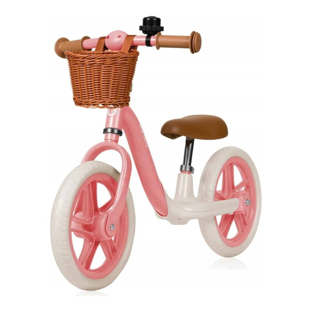 Bicicleta infantil sem pedais rosa e branco com cesto de vime castanho