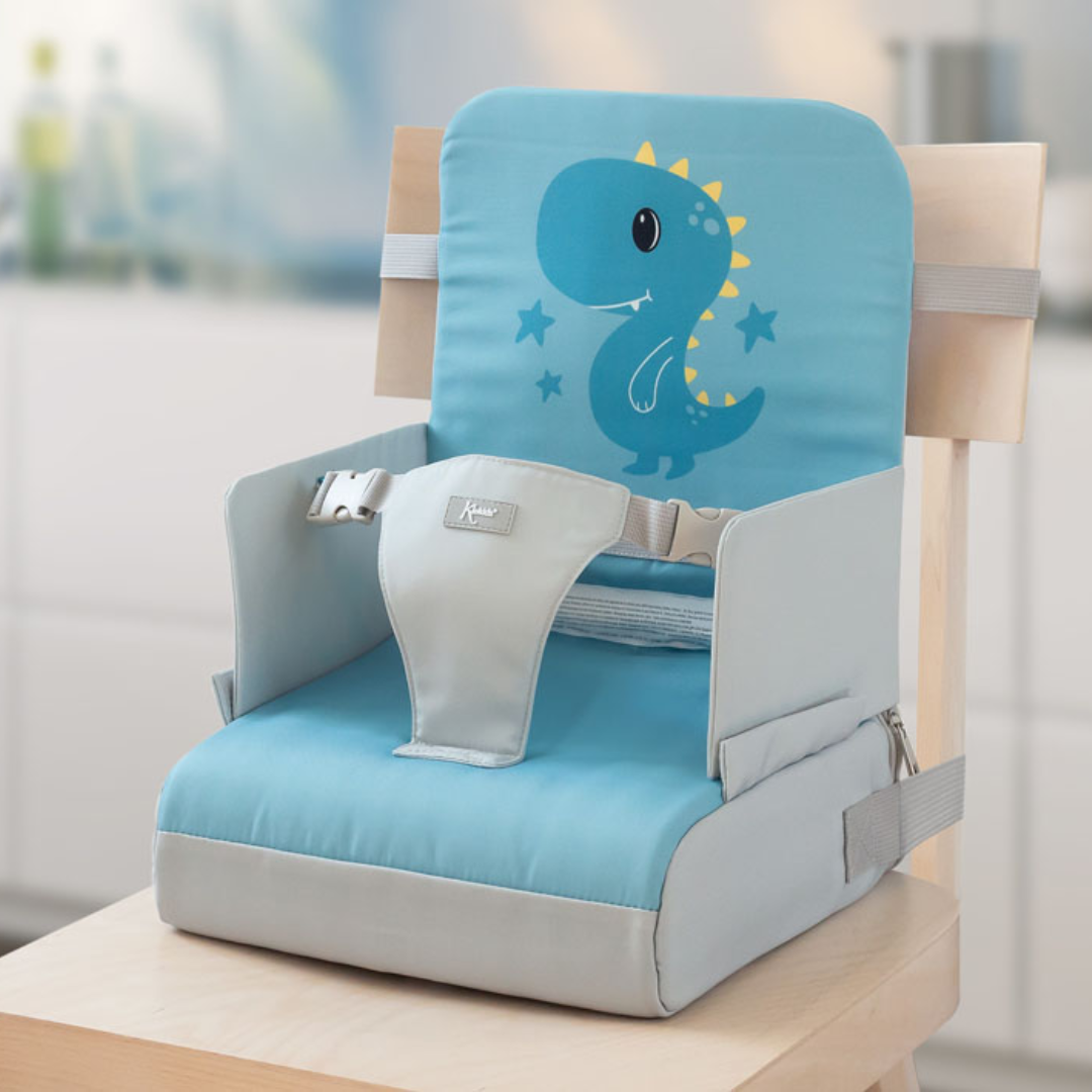 Assento elevatório para criança azul e cinzento com desenho de dinossauro