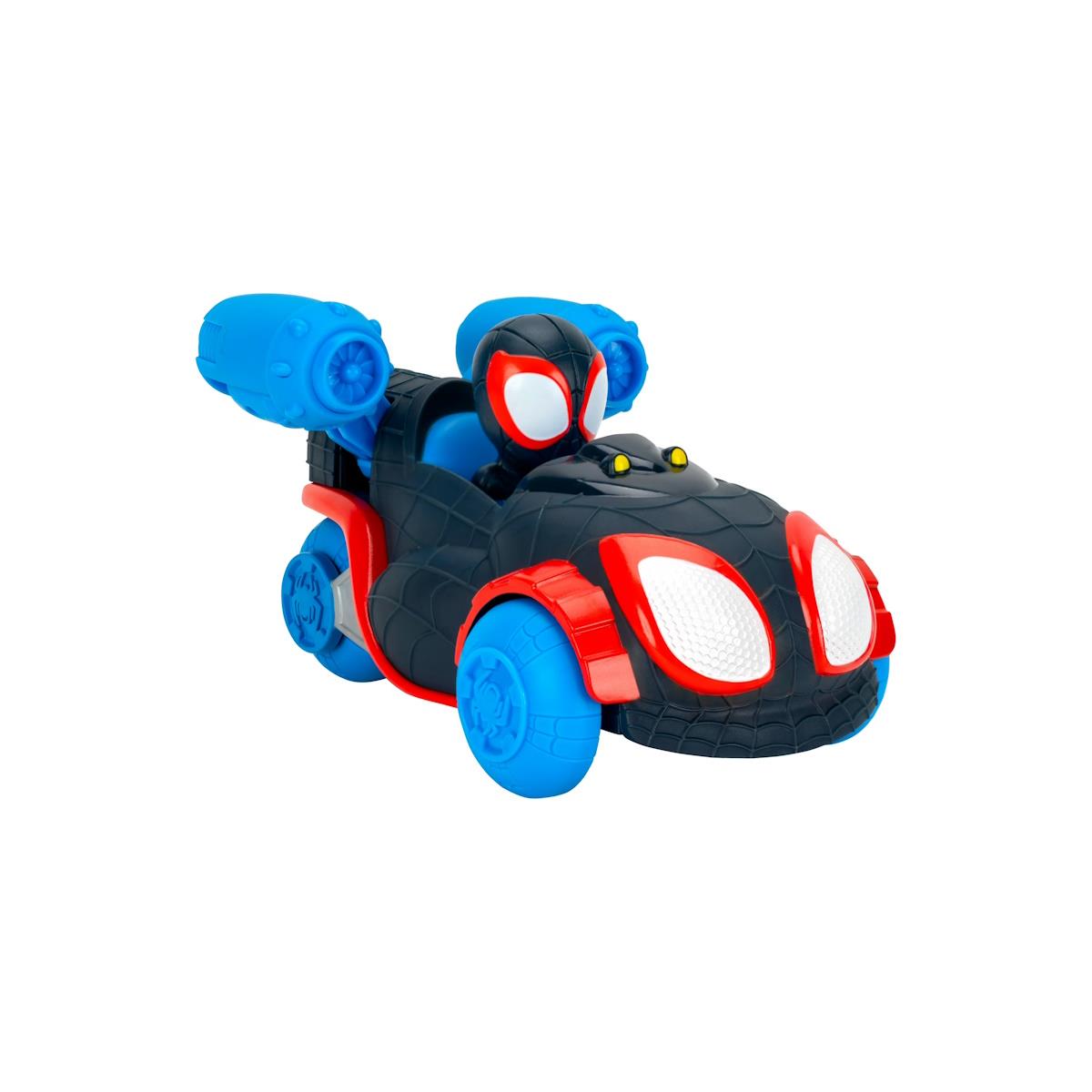 Brinquedo de carro preto e azul com figura de super-herói com máscara preta com olhos brancos e vermelhos