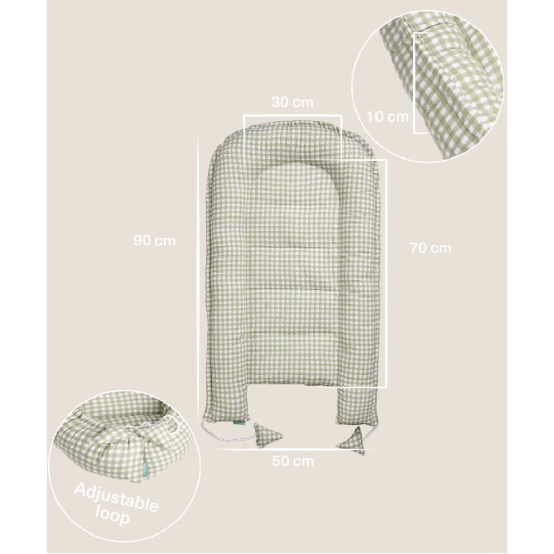 Colchão de apoio verde e branco com padrão quadriculado e loop ajustável