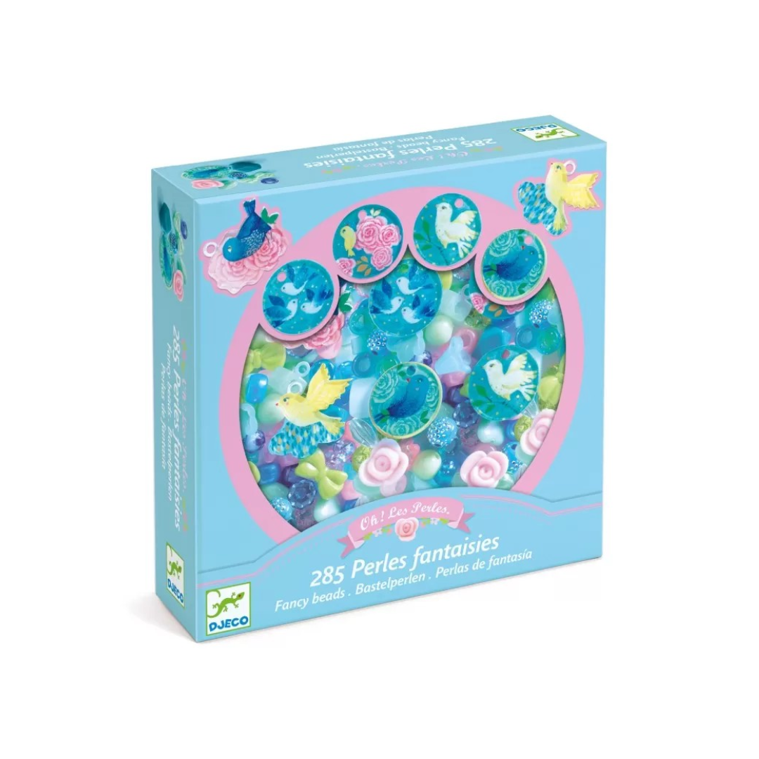 Caixa azul com miçangas coloridas em várias formas e a frase '285 Perles fantaisies'