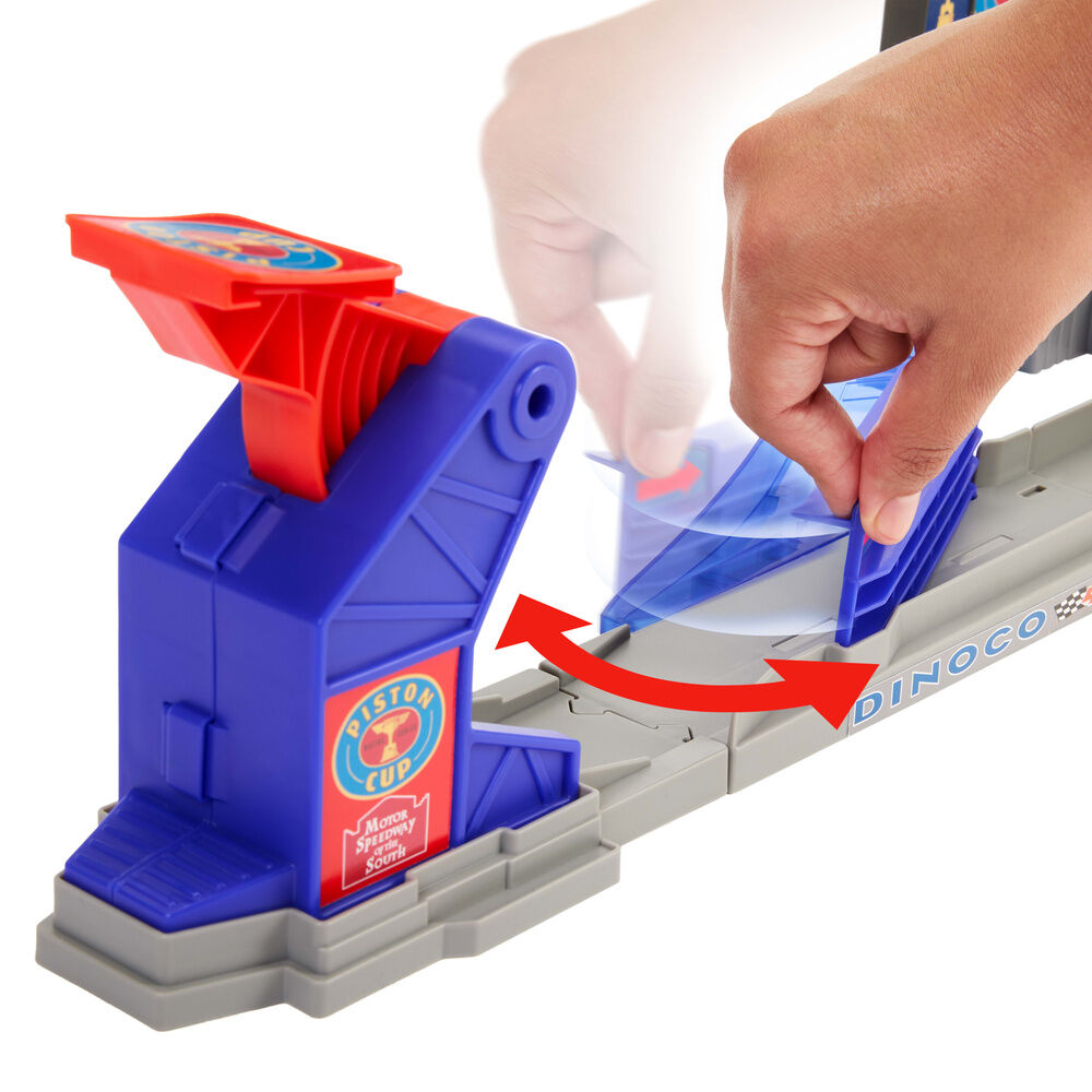 Ativador vermelho e azul de pista de corrida de brinquedo em base cinza