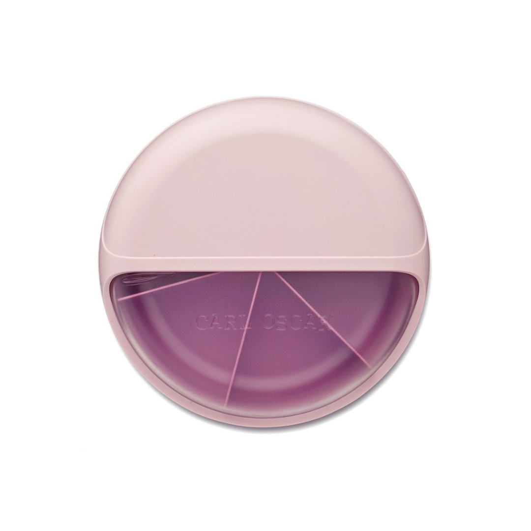 Caixa redonda rosa e roxa com divisórias internas