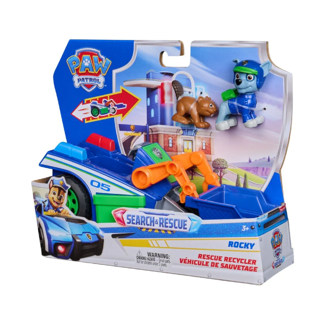 Brinquedo PAW Patrol veículo reciclador azul com figura do cão Rocky e esquilo na embalagem.