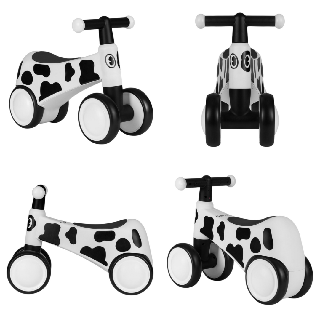 Triciclo infantil com padrão de vaca preta e branca em várias vistas