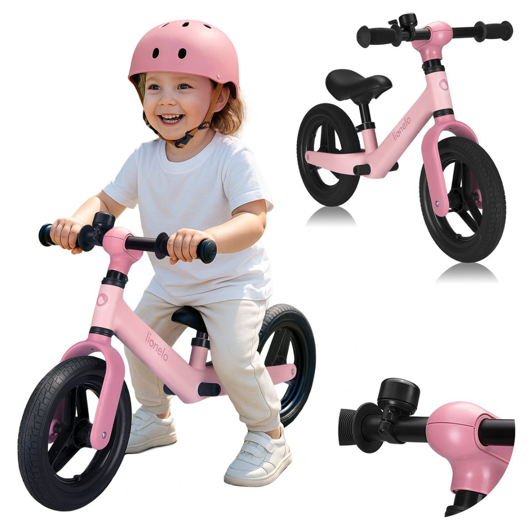 Bicicleta infantil cor-de-rosa com criança e capacete rosa