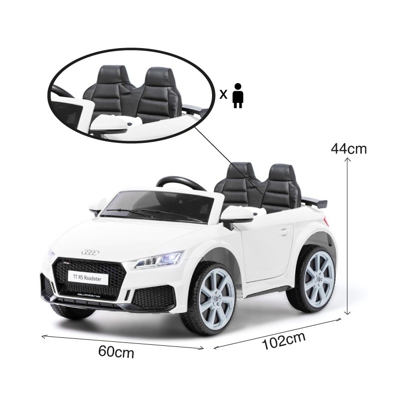 Carrinho elétrico infantil branco estilo Audi TT RS Roadster com bancos pretos e volante.