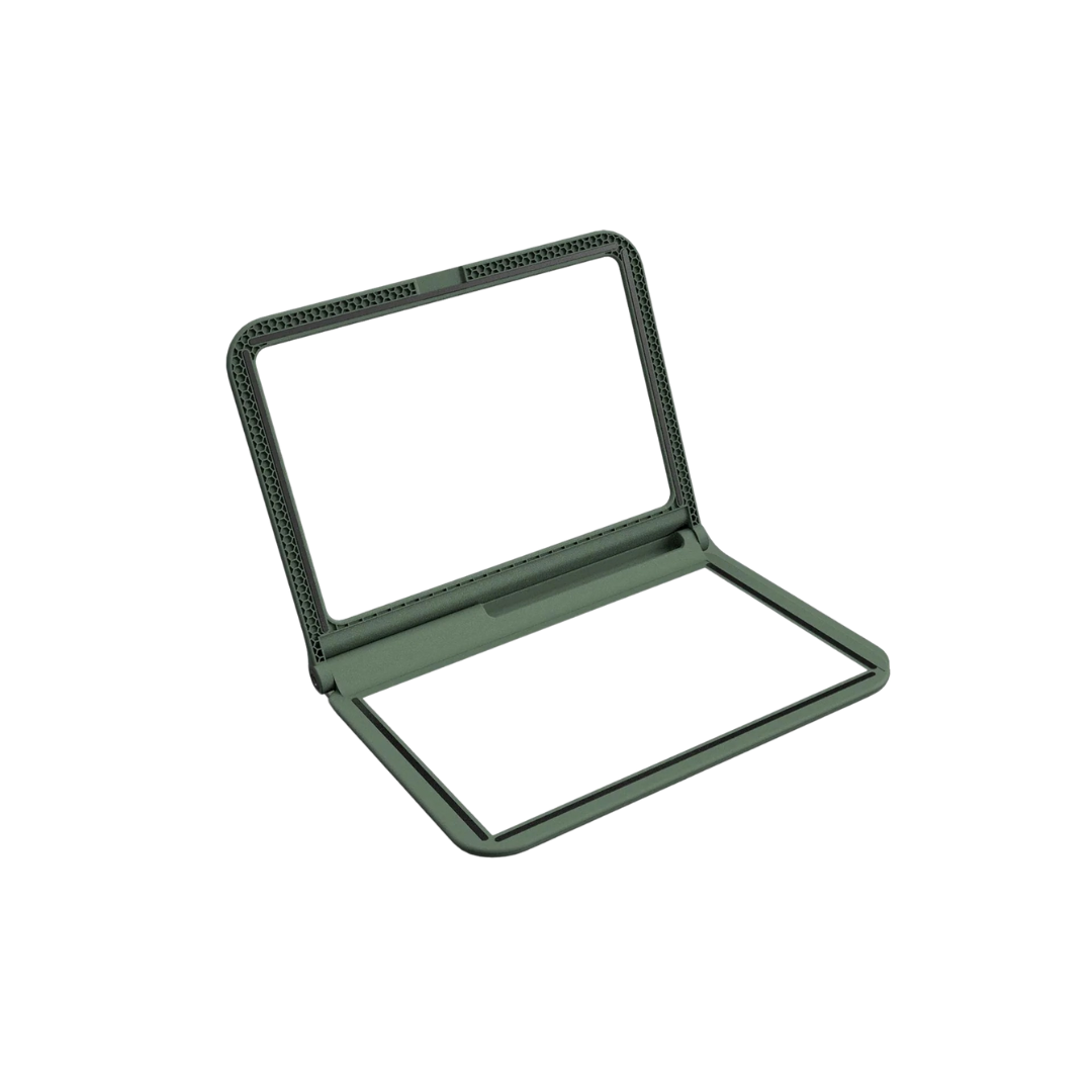 Espelho de maquilhagem retangular com moldura verde escura e textura perfurada