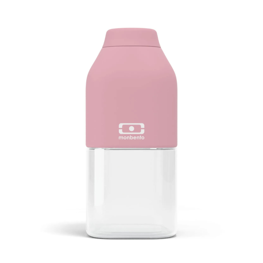 Garrafa Monbento com tampa rosa e corpo transparente