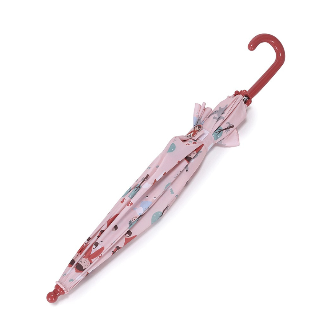 Guarda-chuva fechado cor-de-rosa com padrão de desenhos infantis e cabo curvo vermelho
