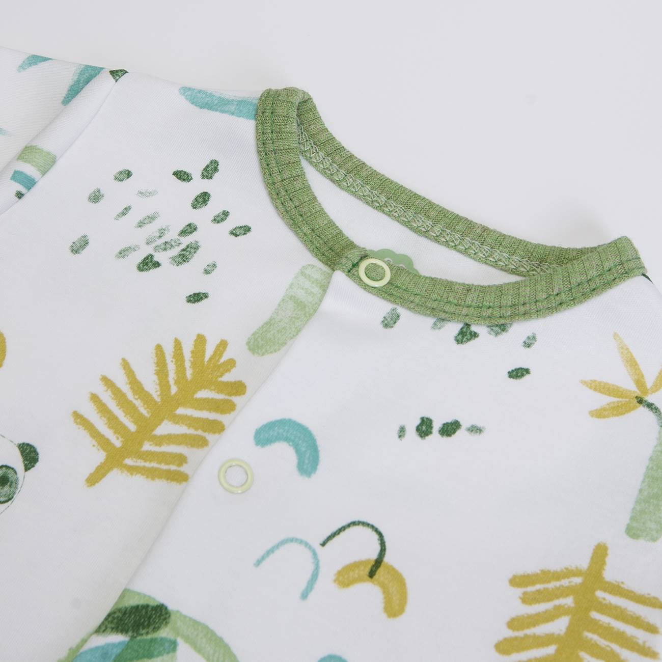 Pelele de bebé com padrão colorido e fecho verde