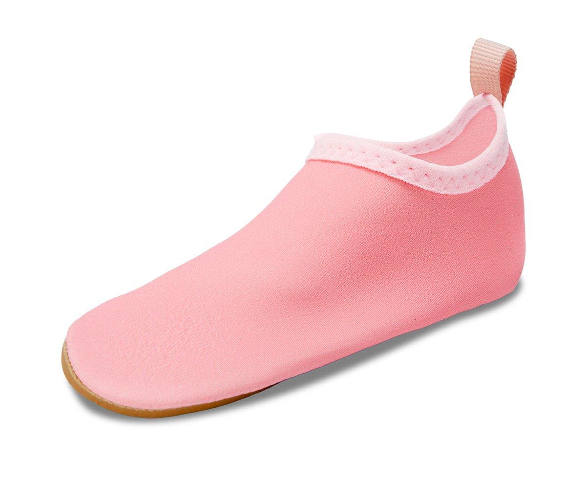 Sapatilha de criança rosa com borda clara e sola castanha