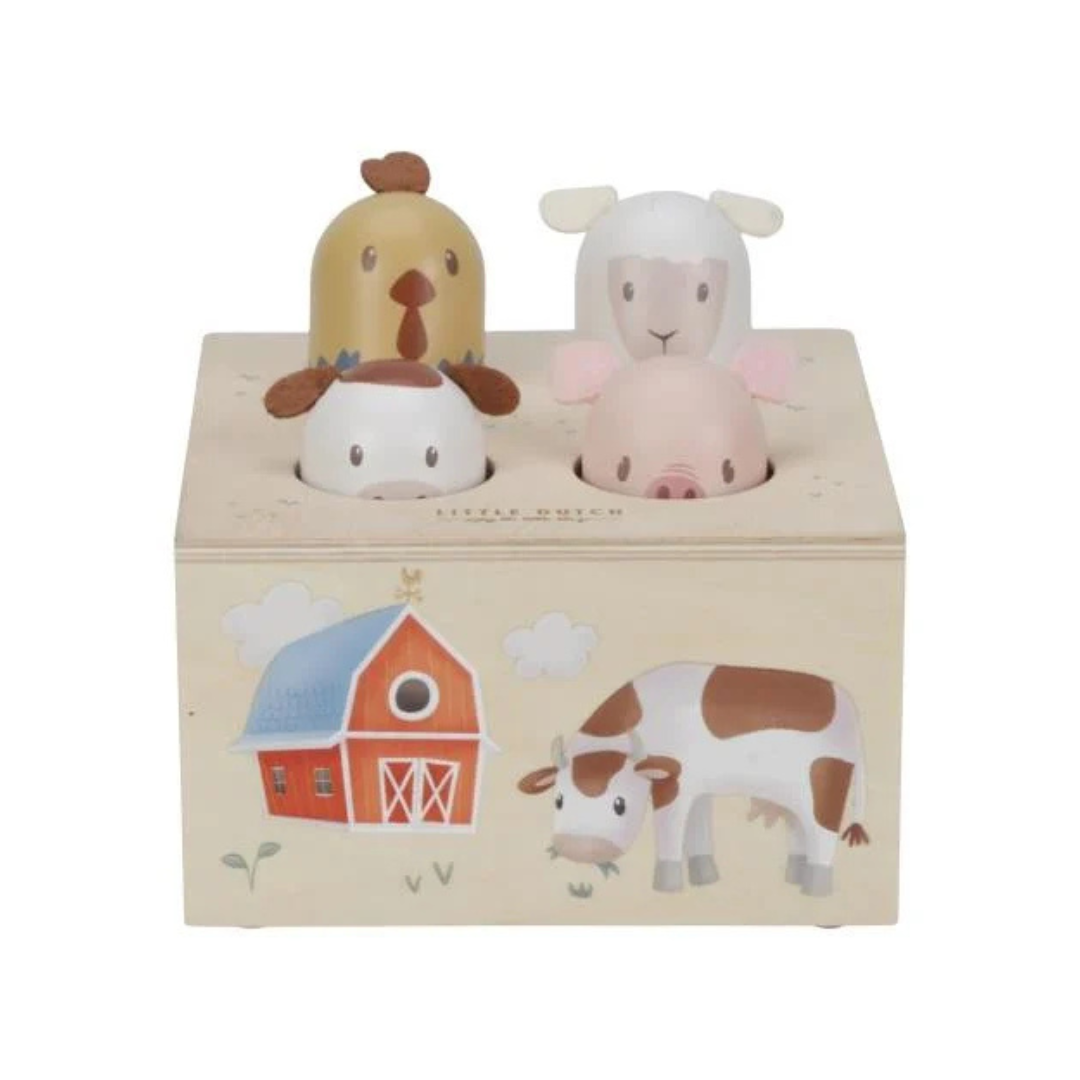 Brinquedo de madeira com animais da quinta e caixa com desenhos coloridos