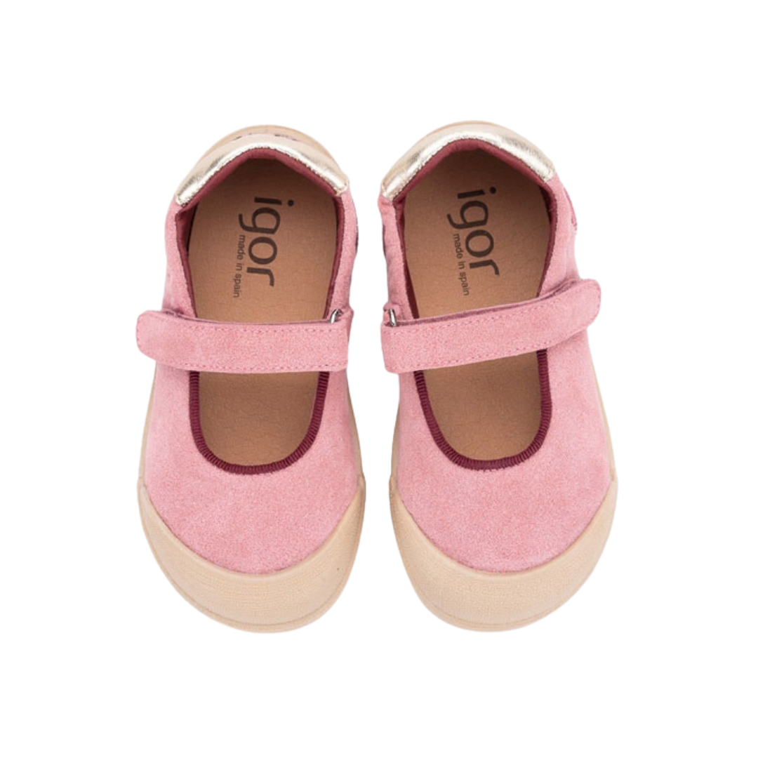 Sapatos infantis cor-de-rosa com sola bege