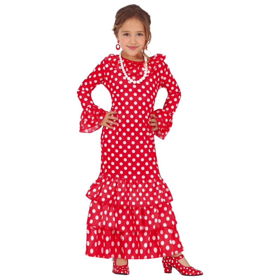 Vestido vermelho de bolinhas brancas em criança com sapatos vermelhos e brincos