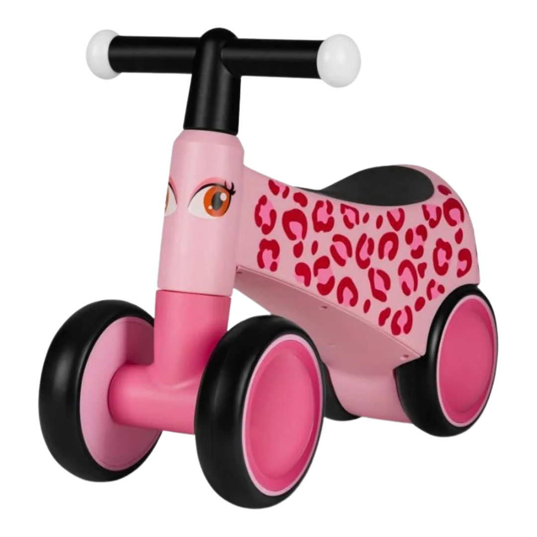 Veículo para crianças rosa com padrão vermelho e guiador preto