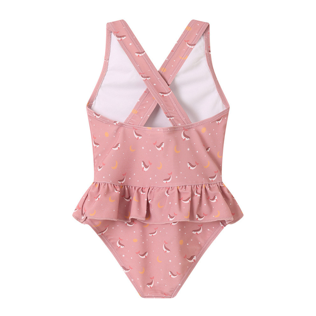 Fato de banho infantil rosa com golfinhos, estrelas, luas, tiras cruzadas e folho