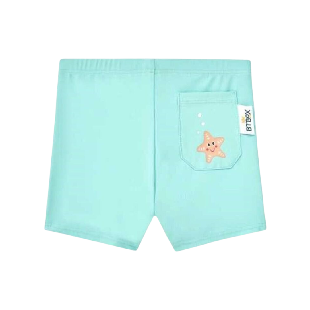 Calções de criança azuis com bolso e estrela-do-mar estampada