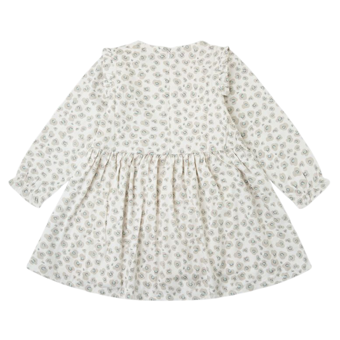 Vestido de criança branco com padrão de pequenos círculos cinza e azul claro