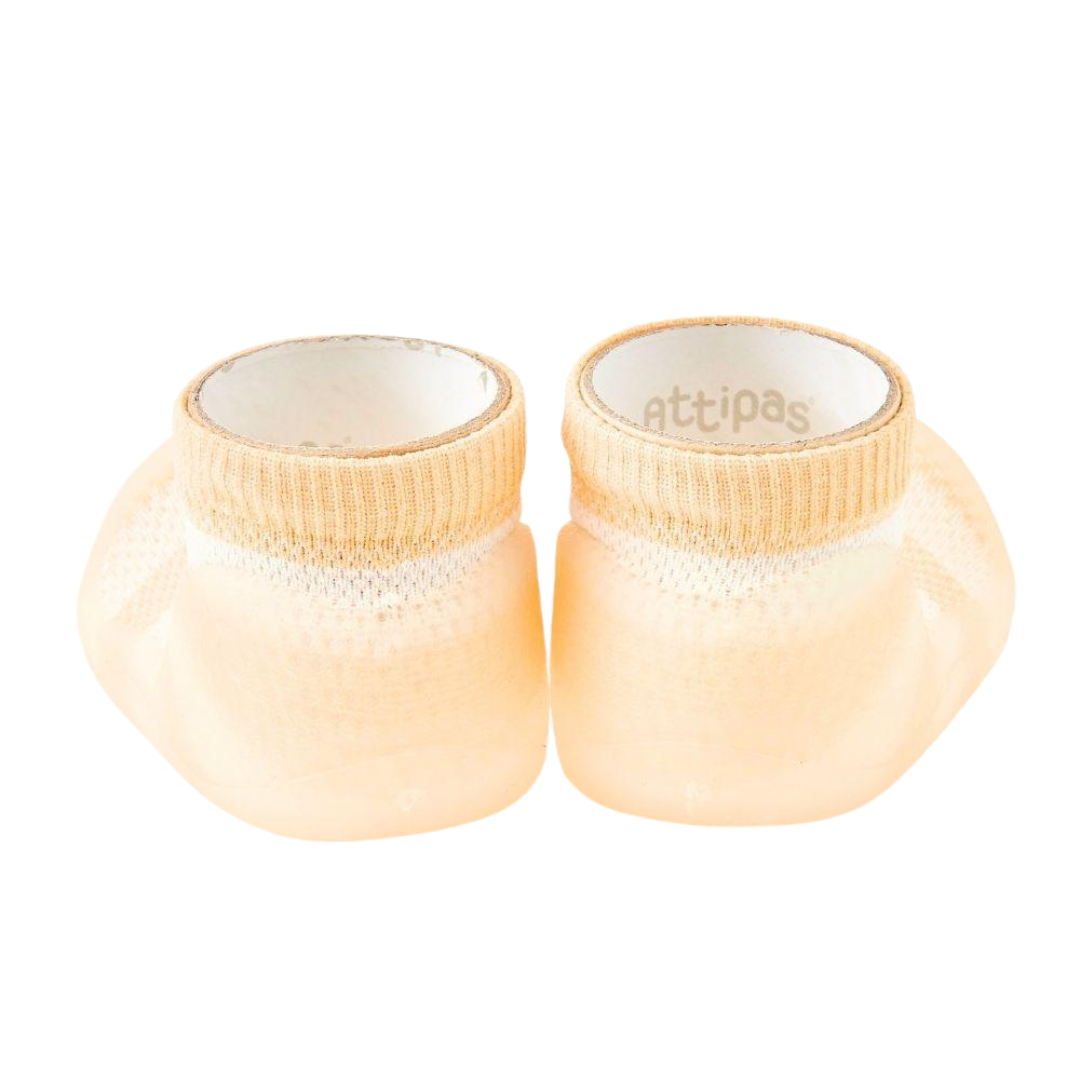 Meias-calçado creme para bebé com sola antideslizante e logo attipas
