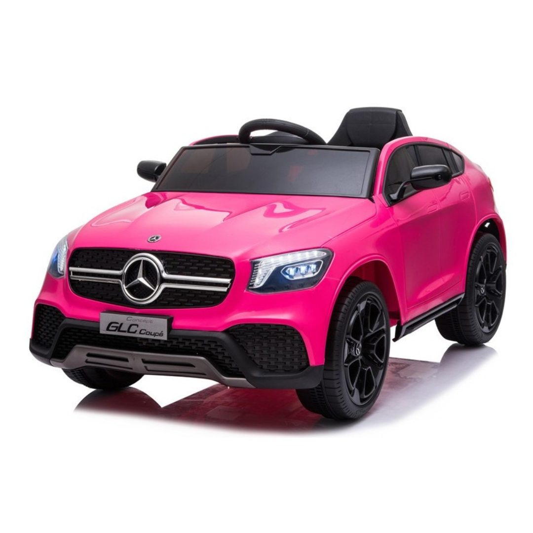 Carro elétrico rosa para criança com detalhes pretos e logo Mercedes-Benz