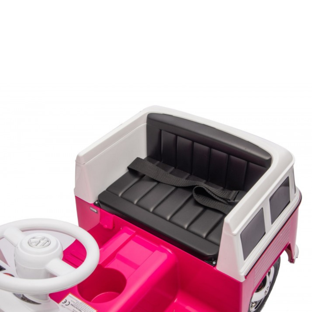 Carro infantil de brinquedo rosa com banco preto e volante branco