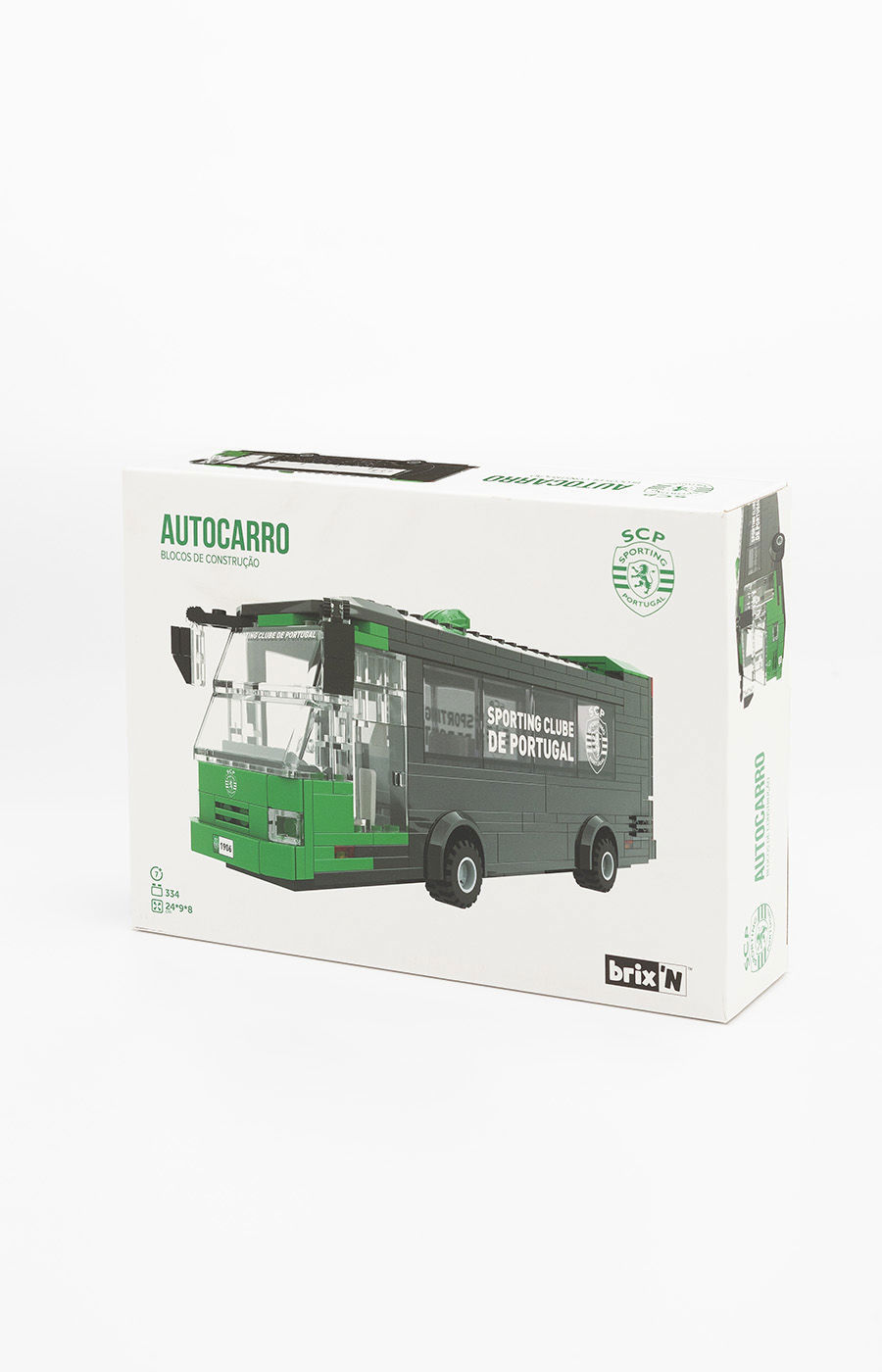 Conjunto de blocos para montar um autocarro Sporting de construção na caixa branca.