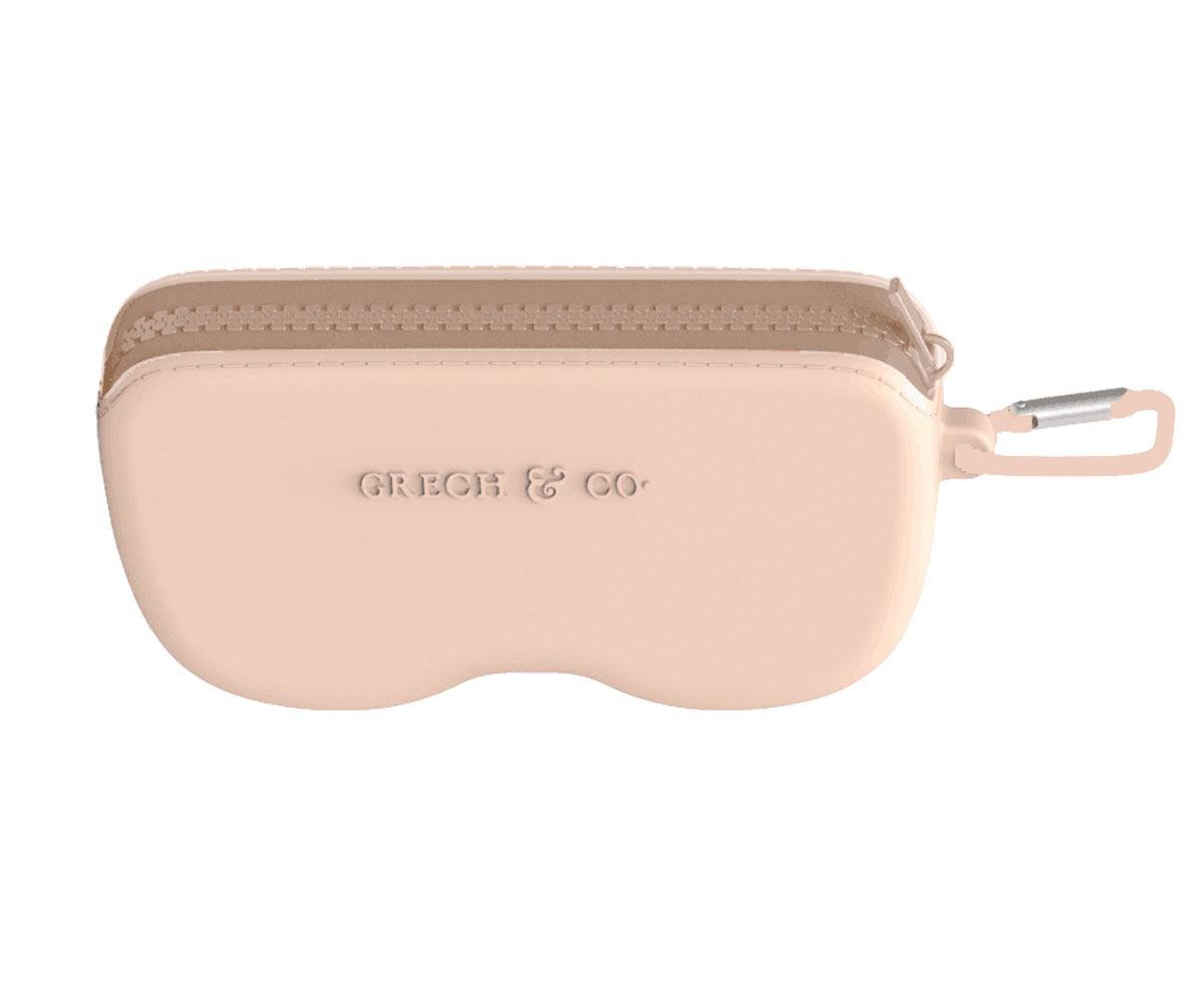 Estojo rígido rosado com fecho castanho e texto GRICH & CO