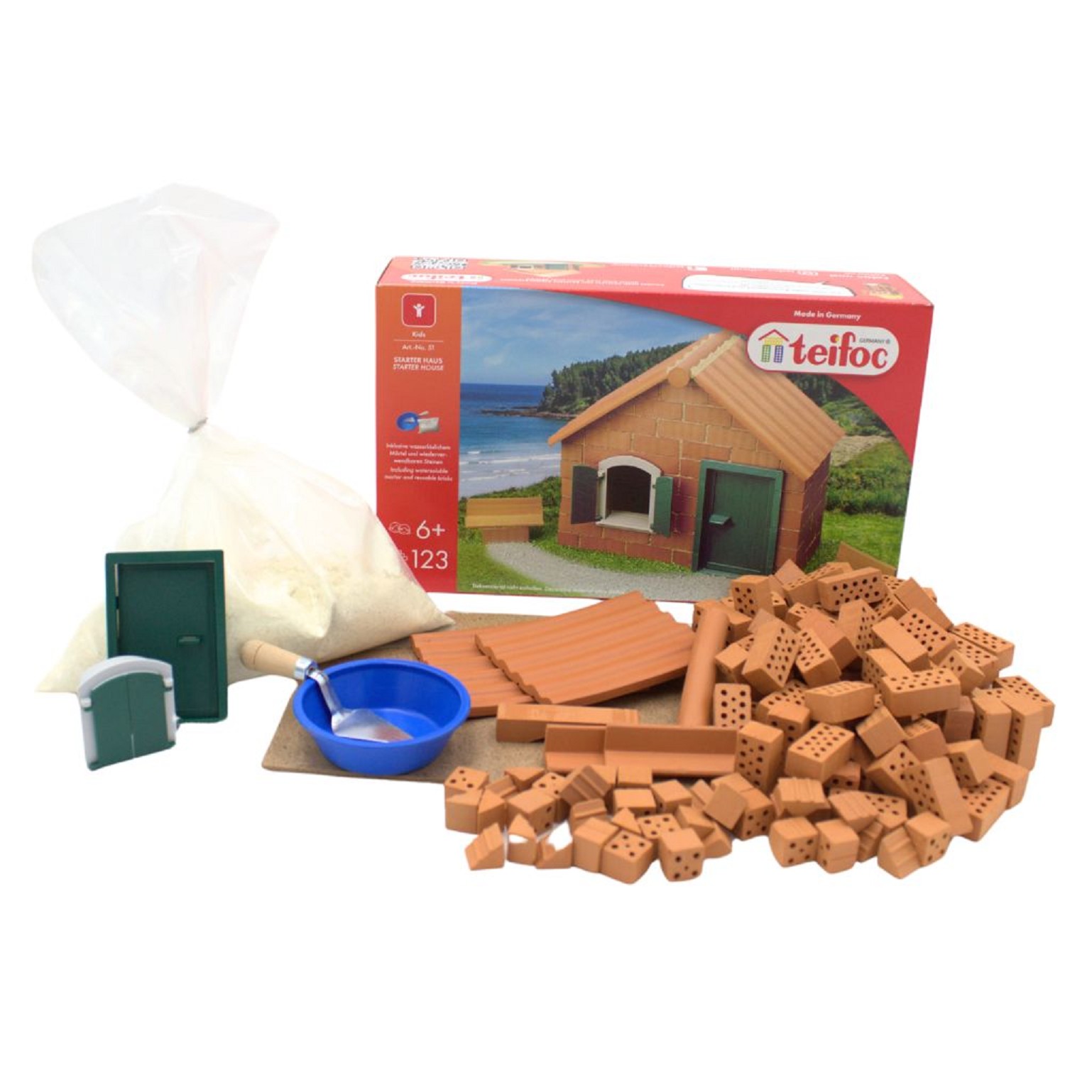 Kit de construção para crianças com tijolos vermelhos e acessórios em embalagem