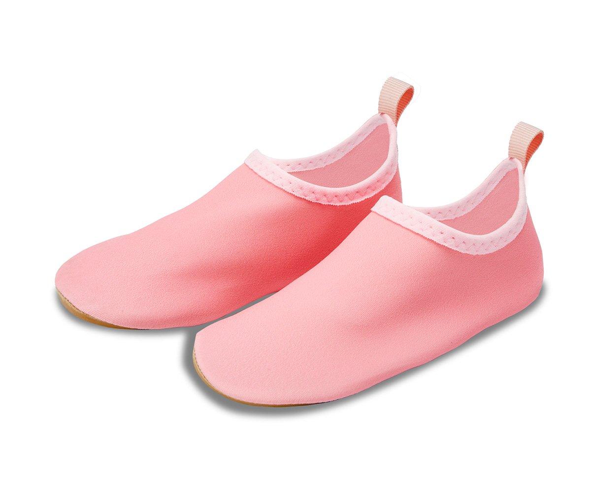 Sapatilhas cor-de-rosa claras com sola fina e lingueta no calcanhar