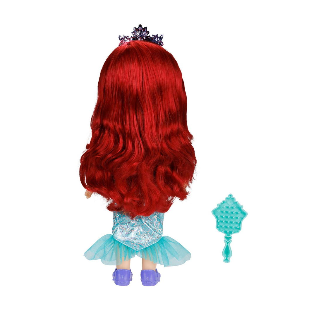 Boneca com cabelo vermelho, vestido azul claro e pente azul turquesa