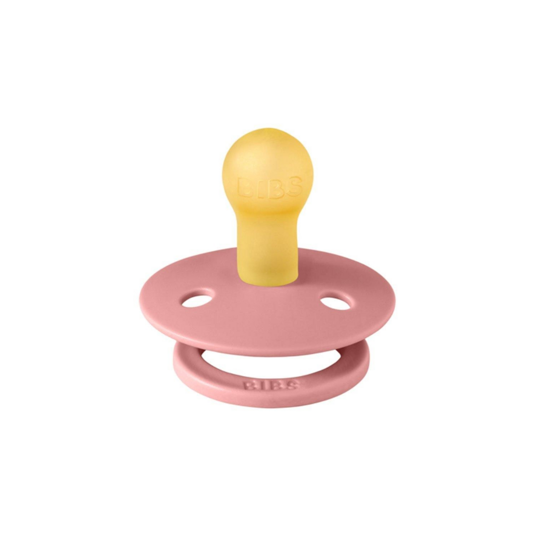 Chupeta BIBS amarela e rosa sobre fundo branco