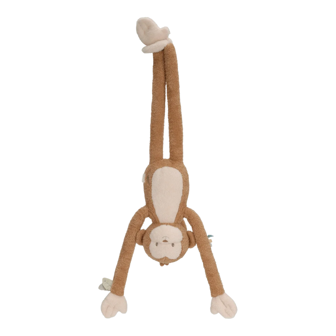 Pelúcia de macaco castanho claro e bege com textura felpuda