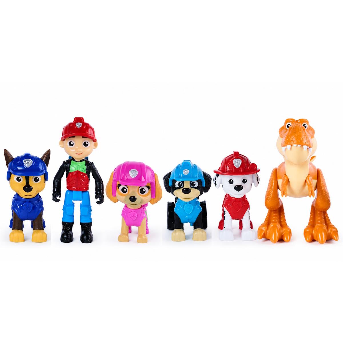 Seis brinquedos de personagens caninos, uma figura humana e um dinossauro, todos em plástico colorido.