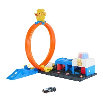 Brinquedo pista Hot Wheels com rampa azul e volta laranja em laço.