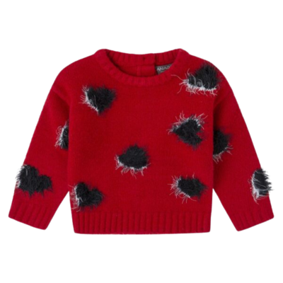 Camisola vermelha com manchas felpudas pretas e brancas