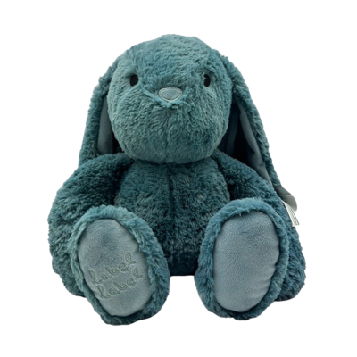 Urso de peluche azul turquesa com texto label label bordado numa pata