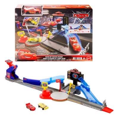 Conjunto de pista de corrida Piston Cup Stunting Speedway com dois carros e embalagem.
