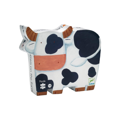 Quebra-cabeças em forma de vaca com padrões pretos e brancos e texto Djeco