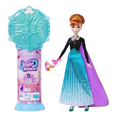 Boneca da personagem Anna de Frozen com suporte azul e rosa e tampa com padrão de floco de neve