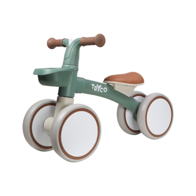 Triciclo infantil verde e branco com assento castanho e texto TRYCO no quadro.
