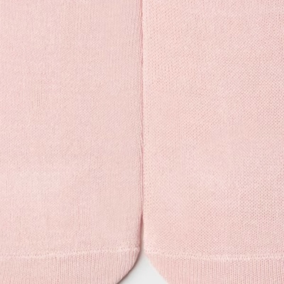Meias rosa claro em tecido malha