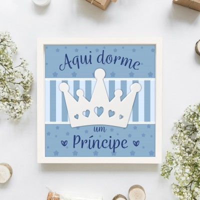 Quadro azul com coroa branca e texto 'Aqui dorme um Príncipe'