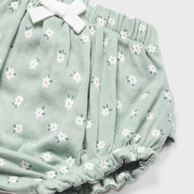 Calções de bebé verdes com flores brancas e laço branco