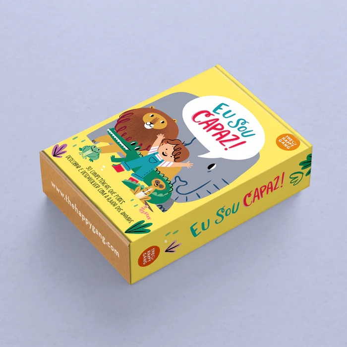 Caixa amarela com ilustrações de animais e criança com o texto Eu Sou CAPAZ!
