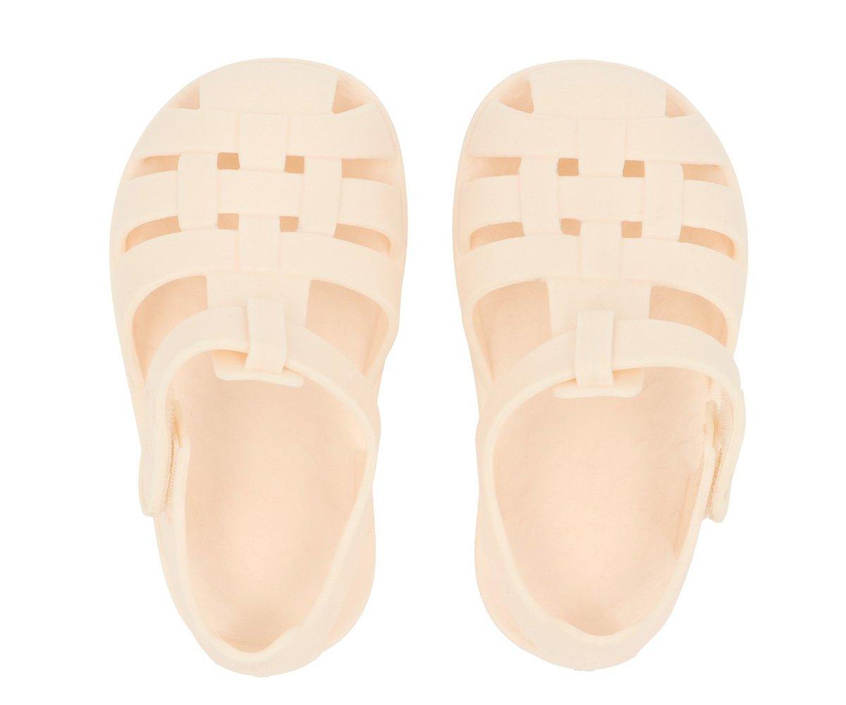 Par de sandálias rosa em material plástico com tiras cruzadas