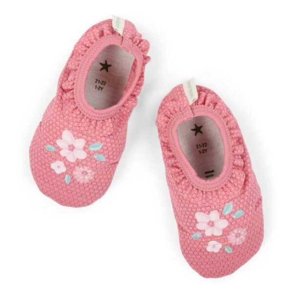 Sapatilhas de bebé cor-de-rosa com flores decorativas