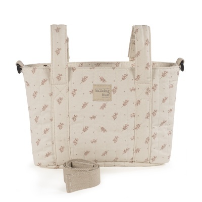 Bolsa bege com padrão de folhas castanhas e etiqueta Walking Mum