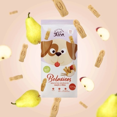 Embalagem de biscoitos orgânicos para cães Bolaxicas com desenho de cachorro e frutas maçã e pêra